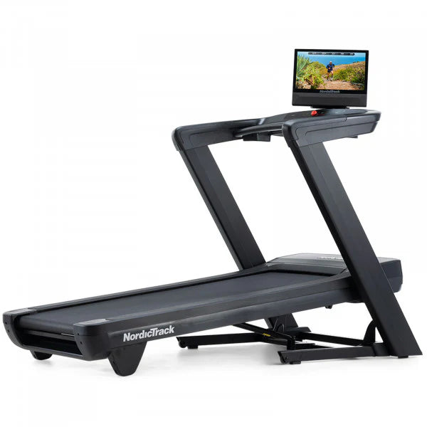 NordicTrack USA Commercial 1750 Treadmill with a 16-inch touchscreen, black in color, with a belt, speakers, and a fan visible.