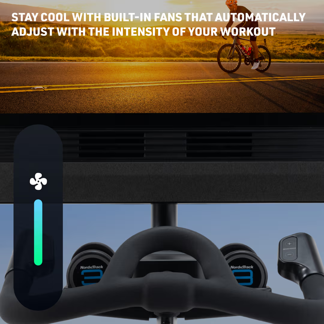 Exercise bike with built-in fans adjusting to workout intensity, person riding a bike in the background.