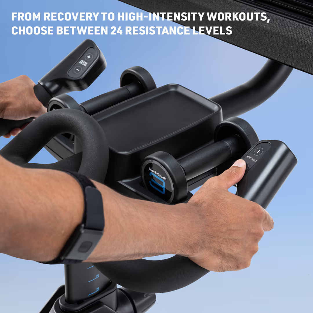 Person using a resistance trainer with digital display on a blue background